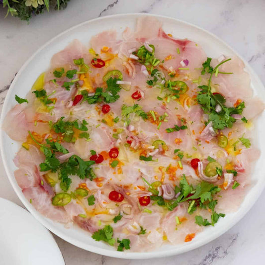 Double Tomato Carpaccio of Tequila Marinated Fish
