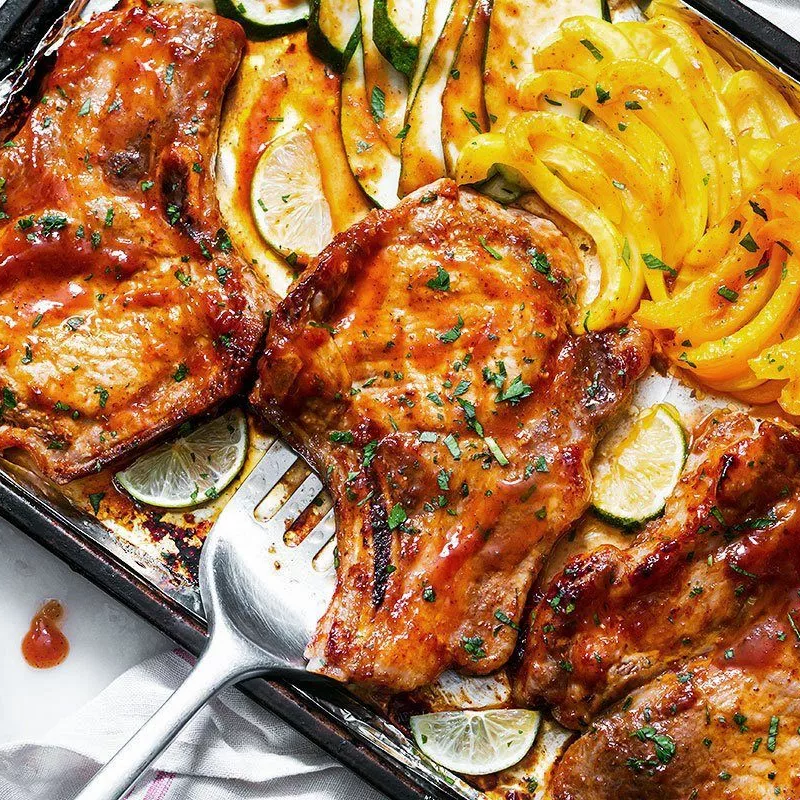 Baked BBQ Pork Chops with Zucchini and Peppers