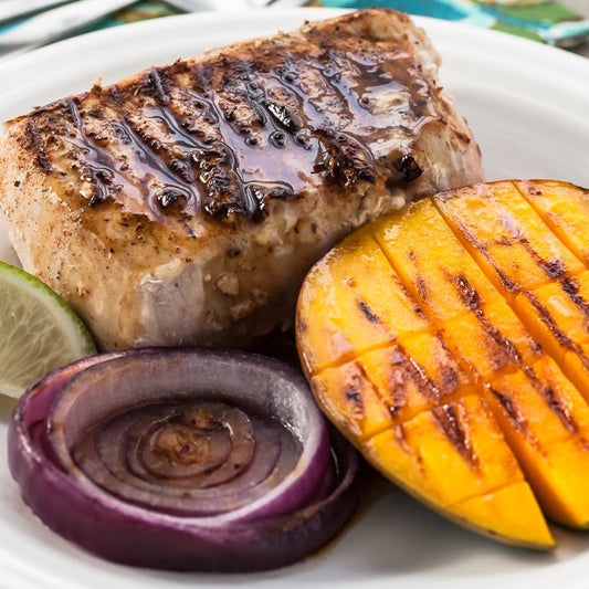 Grilled Jerk Pork Chops with Mango & Rum Sauce