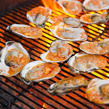 Grilled Oysters with Roasted Orange Pepper Butter